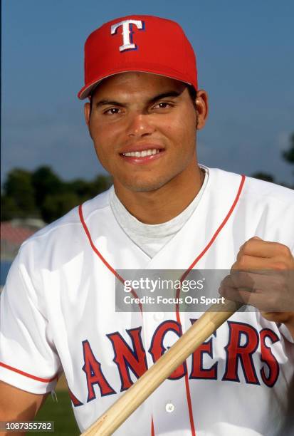 Catcher Ivan Rodriguez of the Texas Rangers poses for this portrait during Major League Baseball spring training circa 1996 at Municipal Stadium in...
