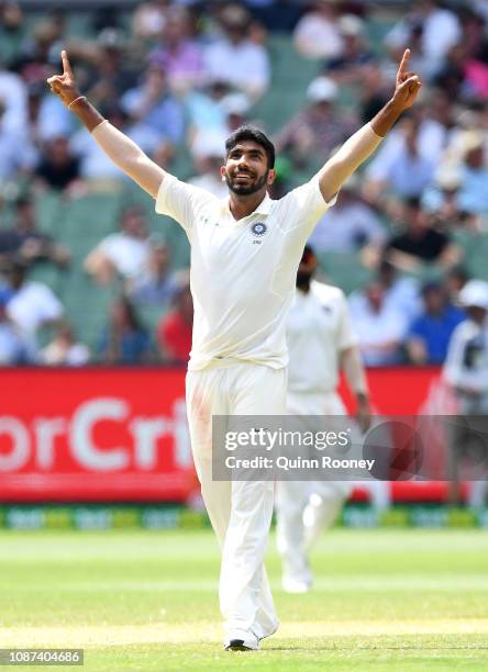 Jasprit Bumrah of India celebrates getting the wicket of Nathan Lyon of Australia during day three of the Third Test match in the series between...