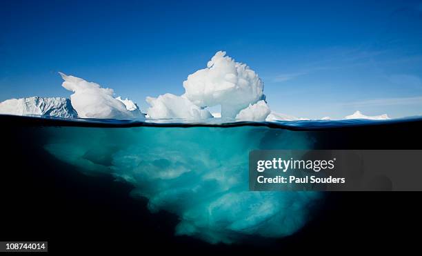 icebergs, disko bay, greenland - underwater iceberg stock-fotos und bilder