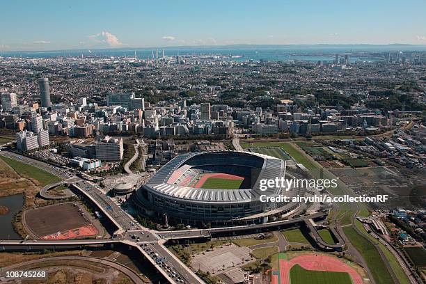 aerial view of nissan stadium, yokohama city, kanagawa prefecture, honshu, japan - yokohama stadium stockfoto's en -beelden