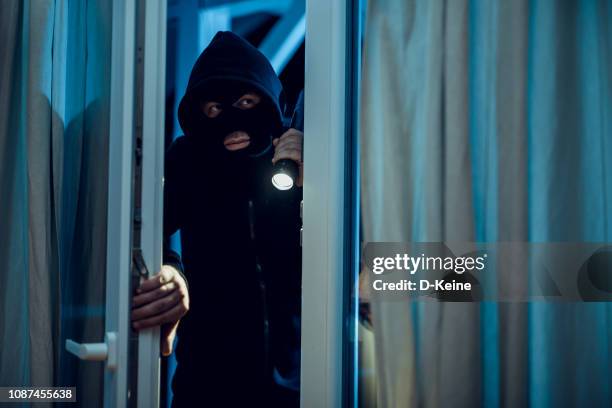 robber - burglar stock pictures, royalty-free photos & images
