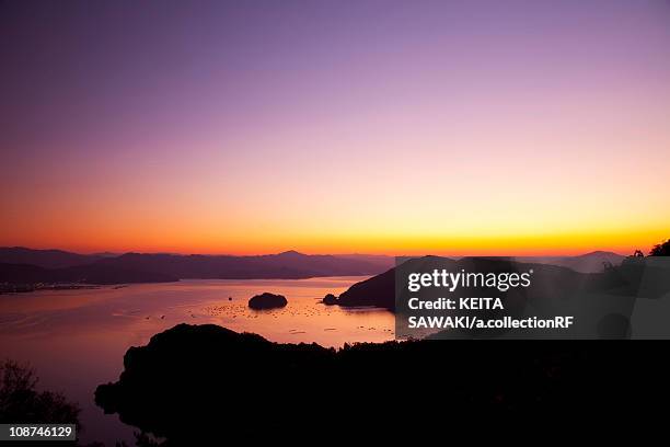 sunset over sea - fukui prefecture foto e immagini stock