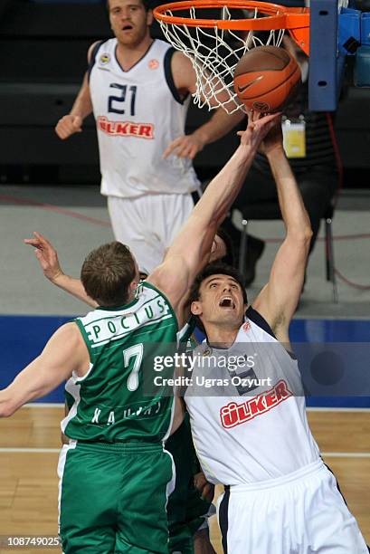Mirsad Turkcan, #6 of Fenerbahce Ulker Istanbul competes with Martynas Pocius, #7 of Zalgiris Kaunas during the 2010-2011 Turkish Airlines Euroleague...