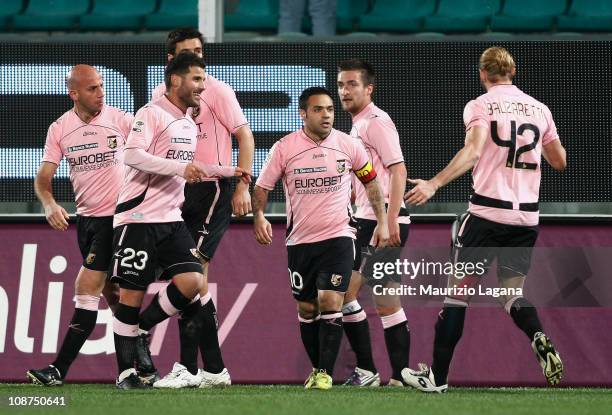 Fabrizio Miccoli of Palermo celebrates with team-mates after scoring the opening goal of the Serie A match between US Citta di Palermo and Juventus...