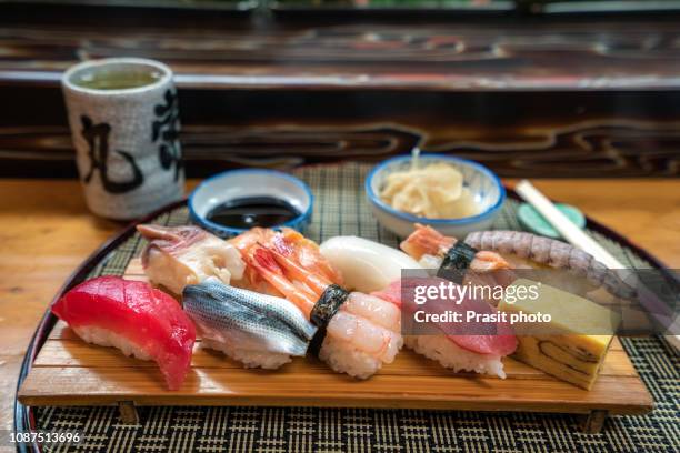 japanese food sushi mix on a restaurant table - nigiri fotografías e imágenes de stock