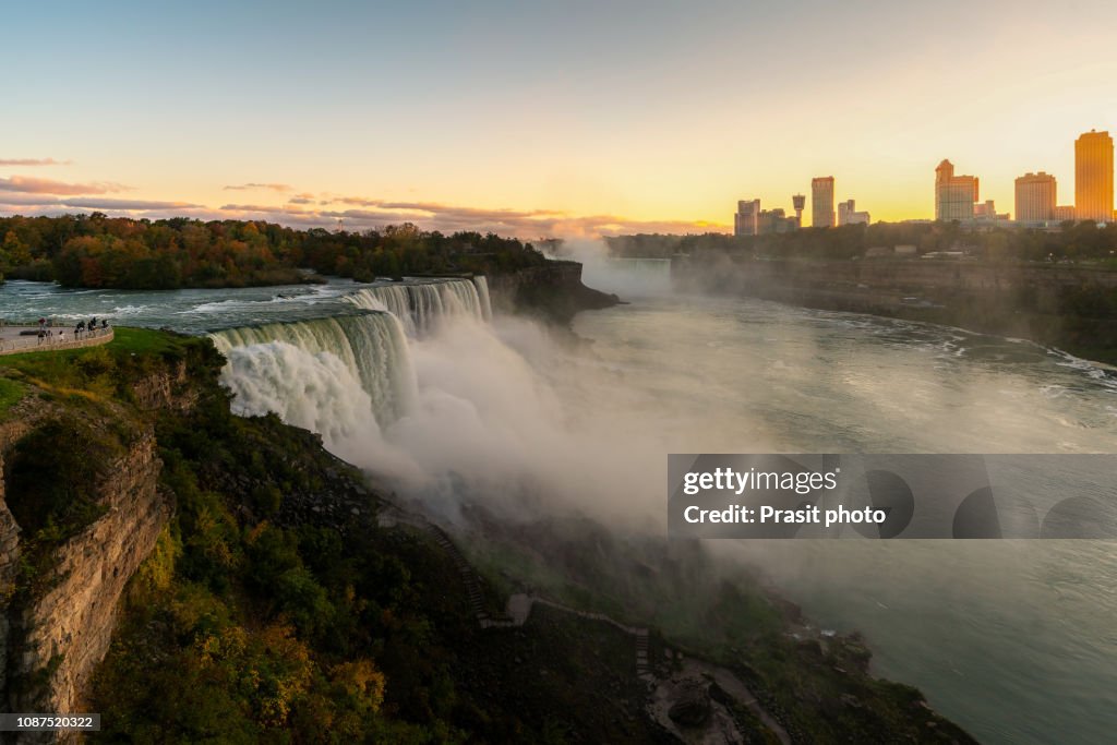 Niagara Falls Waterfall and Colorful Sky at Dawn in New York, USA.