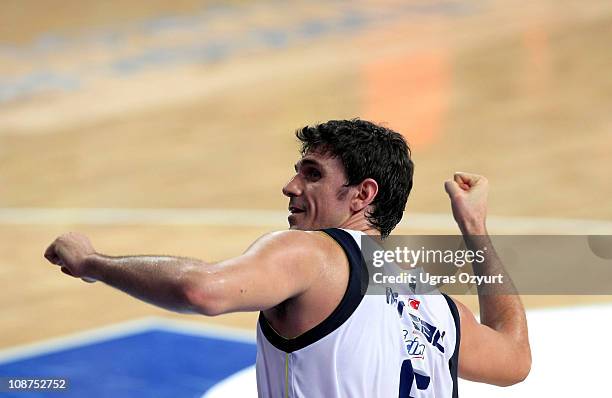 Mirsad Turkcan, #6 of Fenerbahce Ulker Istanbul celebrates during the 2010-2011 Turkish Airlines Euroleague Top 16 Date 3 game between Fenerbahce...