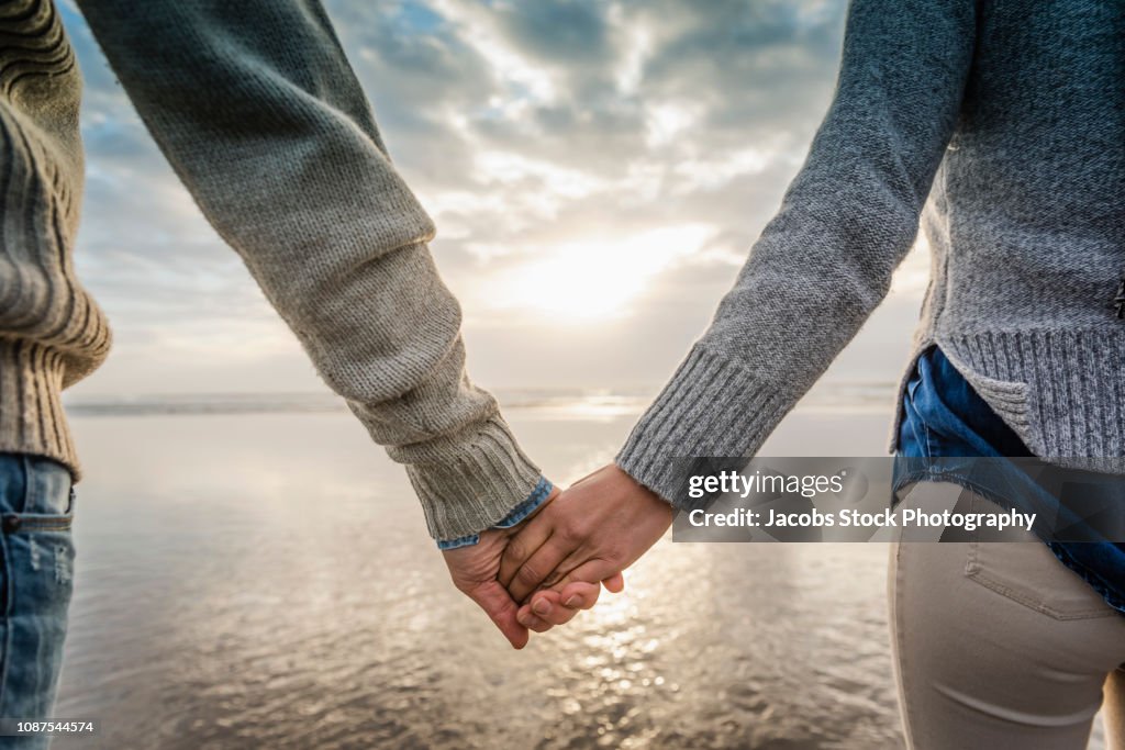 Young Couple Holding Hands
