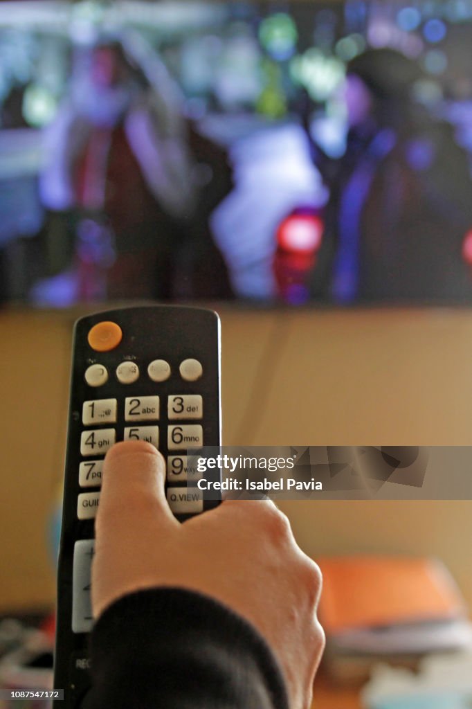 Use Remote Control Boy Using Tv Remote Control Media Concept High-Res Stock Photo - Getty ...