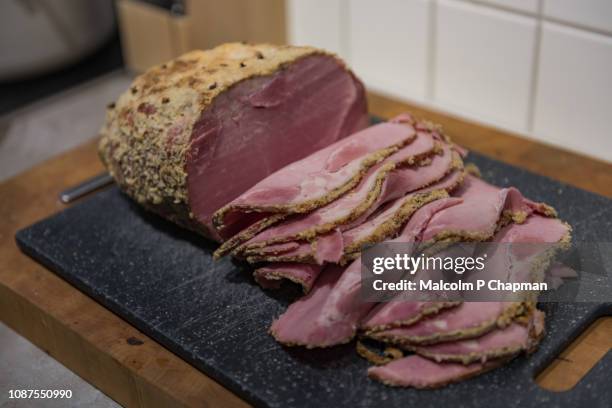 swedish christmas ham, julskinka, on julbord, stockholm, sweden - julbord stock pictures, royalty-free photos & images