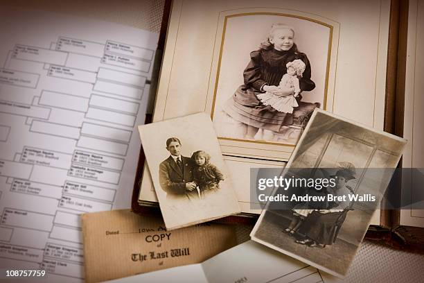 vintage family photo album and documents - stamboom stockfoto's en -beelden