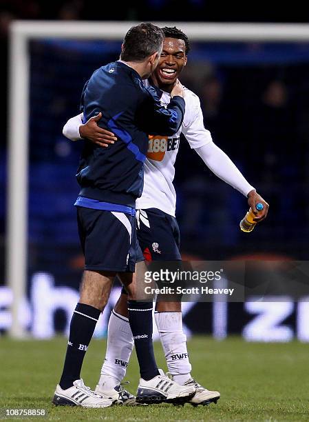 Bolton manager Owen Coyle celebrates with Daniel Sturridge after the Barclays Premier League match between Bolton Wanderers and Wolverhampton...