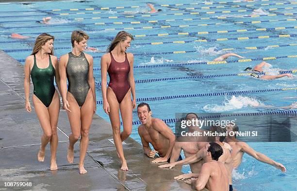 Swimsuit Issue 1994: Model Kathy Ireland, US Olympic swimmer Dara Torres - Gowen and model Elle Macpherson with US Water Polo team pose for the 1994...