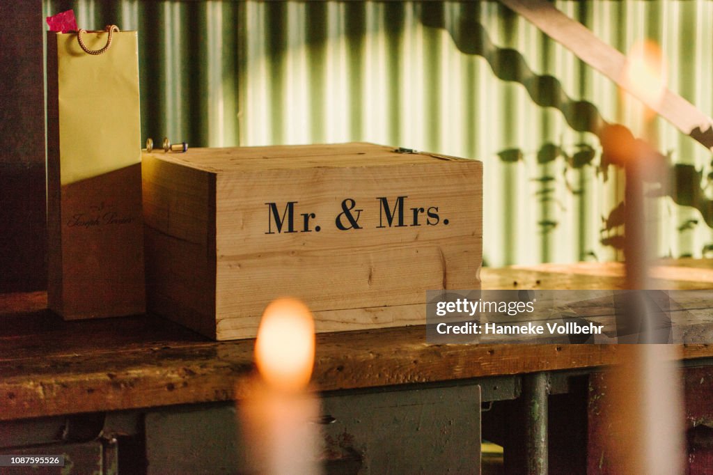 Wooden giftbox with Mr & Mrs on a wedding reception