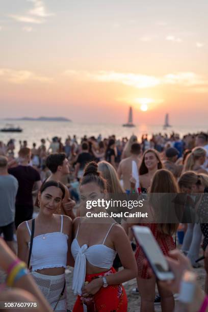 sunset party scene in san antonio, ibiza - ibiza party stock pictures, royalty-free photos & images