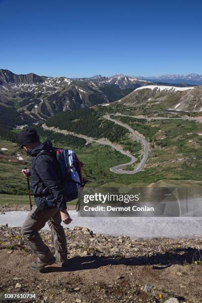 man hiking at loveland pass, colorado - continental divide trail map stock pictures, royalty-free photos & images