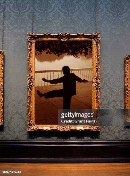 framed photograph hanging on wall. - art frieze exhibition stock pictures, royalty-free photos & images