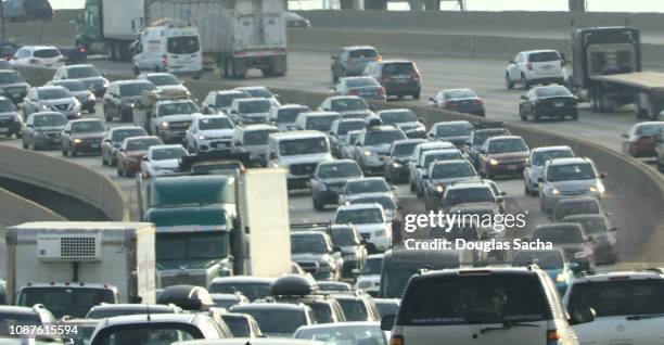 rush hour of busy traffic on the paved highway - traffic jam foto e immagini stock