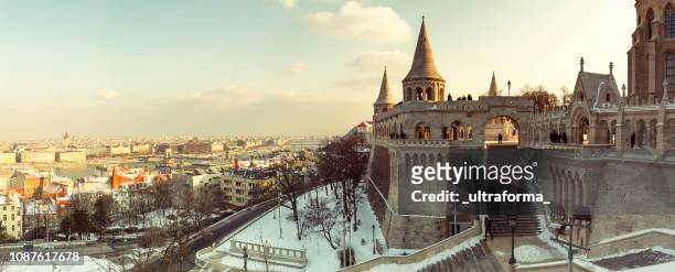 winter panoramic cityscape of budapest with fishermen's bastion and st stephen's basilica at day - budapest winter stock pictures, royalty-free photos & images