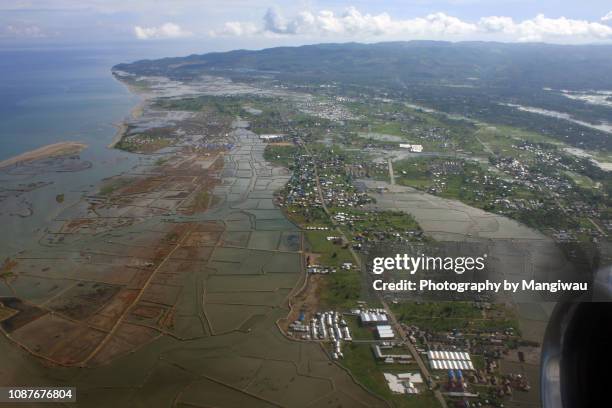 tsunami coastline - tsunami aceh stock-fotos und bilder