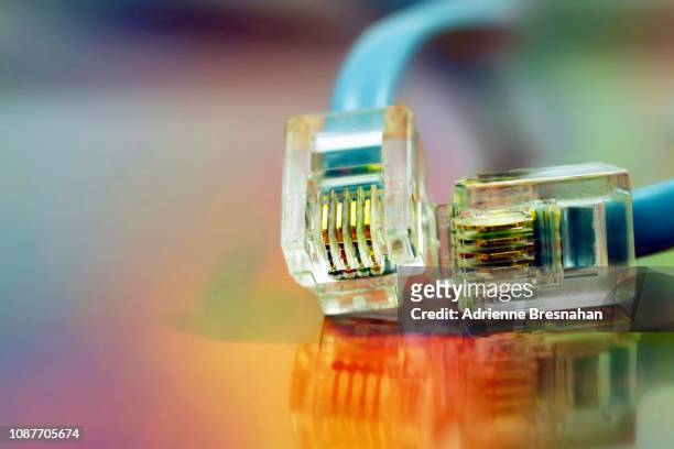 computer ethernet cable - plug in stock pictures, royalty-free photos & images