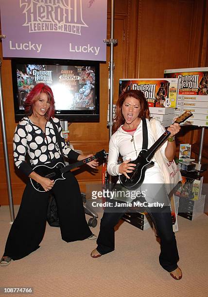 Personalities Jennifer Widerstrom and Valerie Waugaman of American Gladiators pose at Guitar Hero III during the Fifth Annual LUCKY CLUB on May 12,...