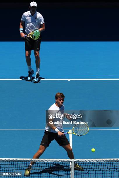 Ryan Harrison of the United States plays a backhand in his Doubles Semifinals match with Sam Querrey of the United states against Pierre-Hugues...