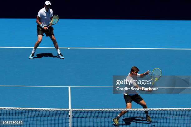 Ryan Harrison of the United States plays a backhand in his Doubles Semifinals match with Sam Querrey of the United states against Pierre-Hugues...