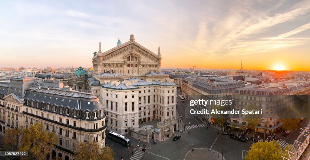 Panoramic view of Paris skyline with Garnier Opera and Eiffel Tower during sunset, Paris, France