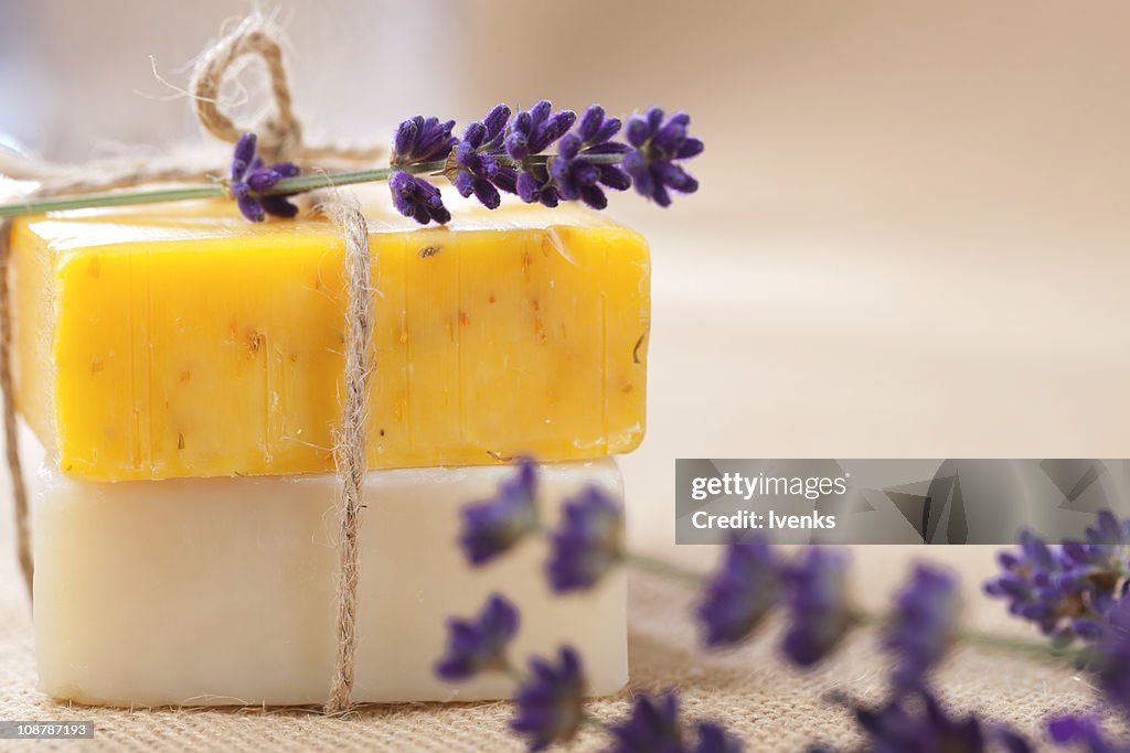 Handmade  soap bars with lavender flowers, shallow DOF