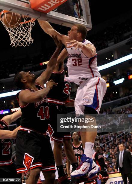 Blake Griffin of the Los Angeles Clippers dunks over Kurt Thomas of the Chicago Bulls at Staples Center on February 2, 2011 in Los Angeles,...