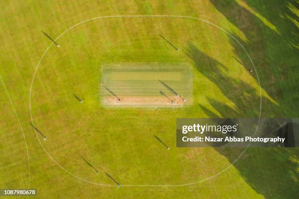 aerial view of cricket game. - クリケット競技場 ストックフォトと画像