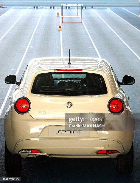 The new Alfa Romeo MiTo Sprint Special Edition is presented during it's launch in North London's Lee Valley Athletics track, on February 3, 2011. AFP...