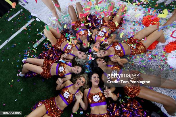 The Clemson Tigers cheerleaders celebrate after defeating the Notre Dame Fighting Irish during the College Football Playoff Semifinal Goodyear Cotton...