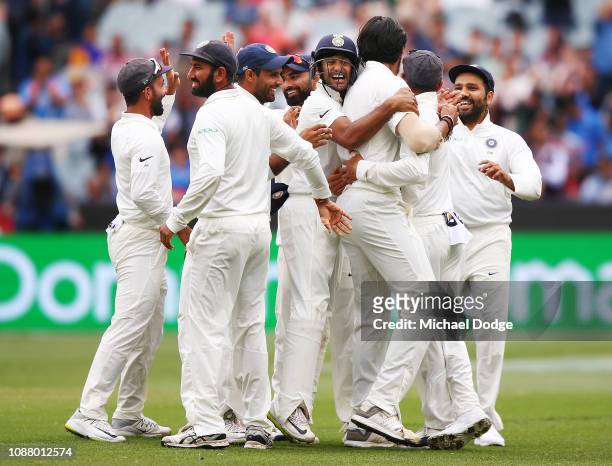 India players celebrate the win during day five of the Third Test match in the series between Australia and India at Melbourne Cricket Ground on...
