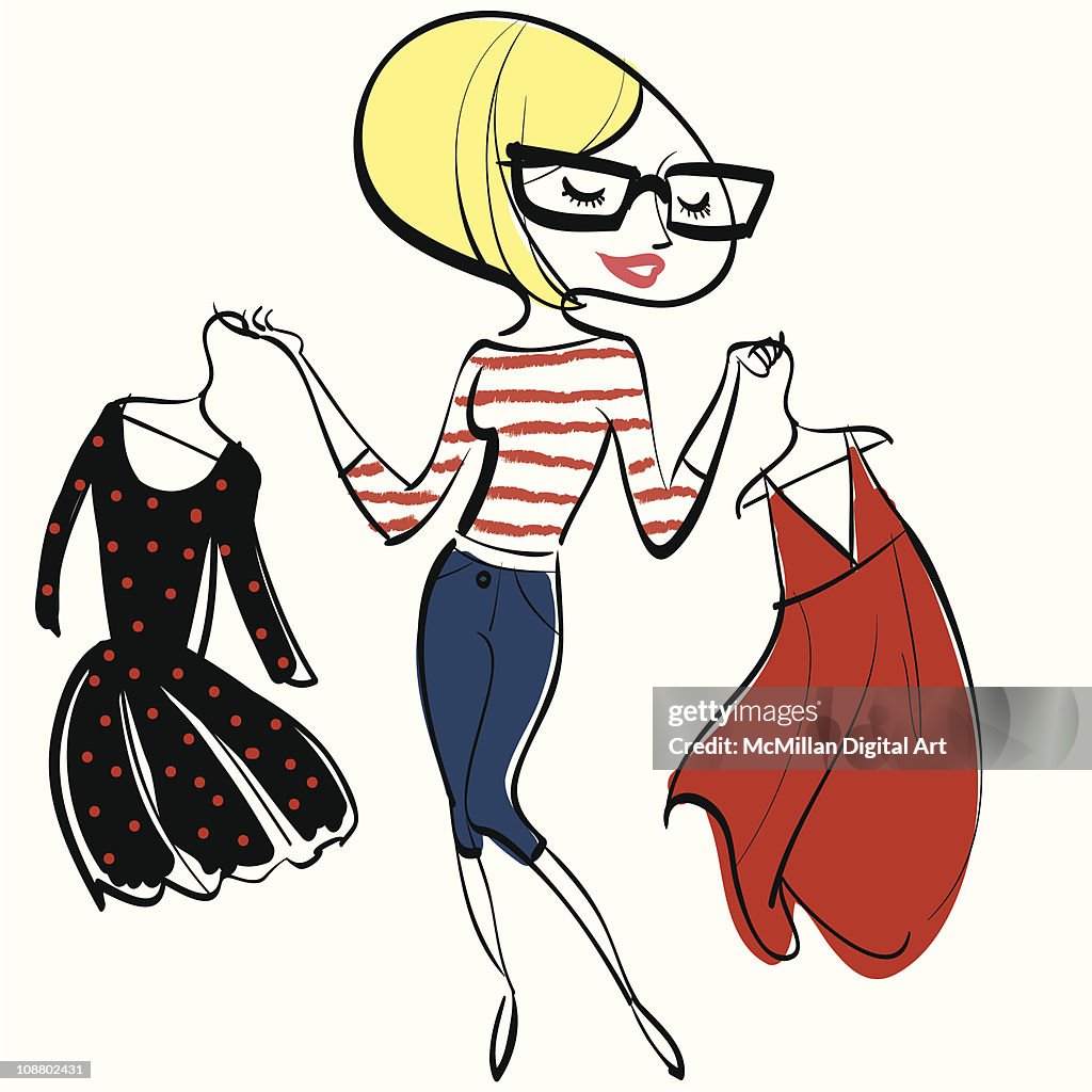 Woman holding two dresses on hangers