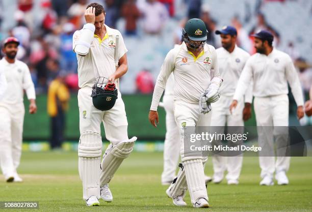 Josh Hazlewood and Nathan Lyon of Australia walk off after defeat during day five of the Third Test match in the series between Australia and India...