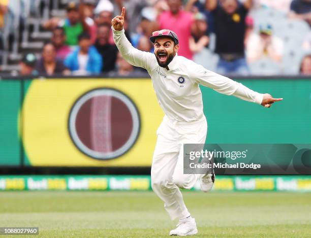 Virat Kohli of India reacts after the dismissal of Pat Cummins of Australia during day five of the Third Test match in the series between Australia...