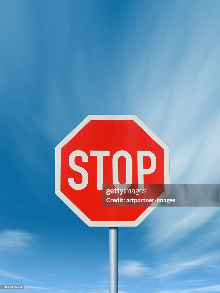 Stop - Traffic Sign with deep blue Sky