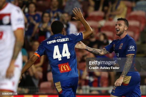 Roy O'Donovan of the Newcastle Jets celebrates his goal with Nikolai Topor-Stanley during the round 10 A-League match between the Newcastle Jets and...