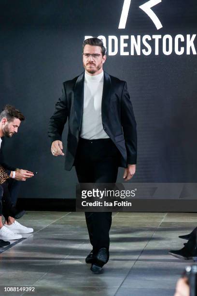 Thomas Seitel walks the runway during the Rodenstock Eyewear Show 'A New Vision of Style' at Isarforum on January 24, 2019 in Munich, Germany.