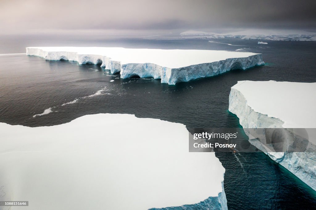 Sailing through enormously huge icebergs near Melchior islands