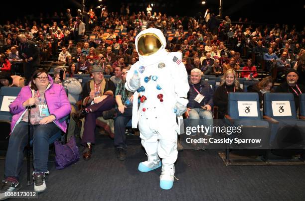 An astronaut poses with the audience during the "Apollo 11" Premiere during the 2019 Sundance Film Festival at The Ray on January 25, 2019 in Park...