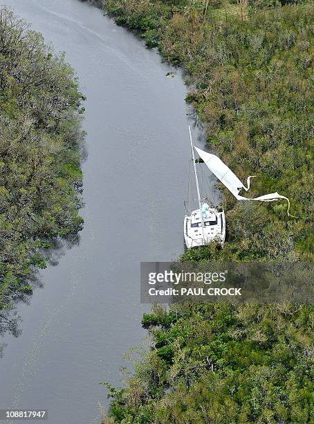 An aerial photo taken on February 3, 2011 shows a damaged catamaran in the aftermath of Cyclone Yasi at Mission Beach on February 3, 2011. Smashed...