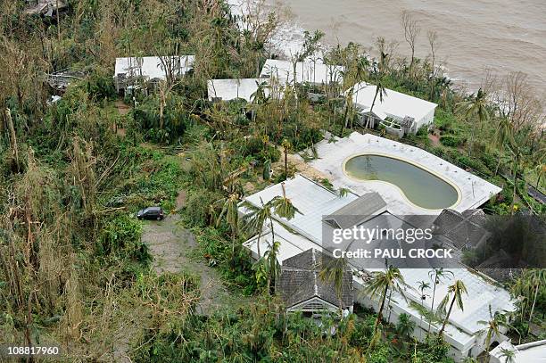 An aerial photo taken on February 3, 2011 shows the aftermath of Cyclone Yasi at Mission Beach on February 3, 2011. Smashed yachts lay stacked like...
