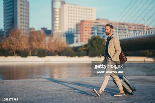 businessman on business trip in valencia - business casual walking stock pictures, royalty-free photos & images