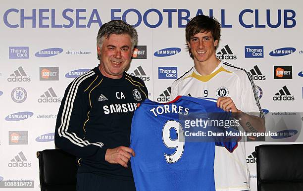 Manager Carlo Ancelotti and Fernando Torres pose for the media at the Chelsea Press Conference on February 4, 2011 in Cobham, England.