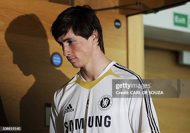 Chelsea's new signing, Spanish striker Fernando Torres arrives for a press conference at Chelsea's training grounds in Cobham, Surrey, on February 4,...