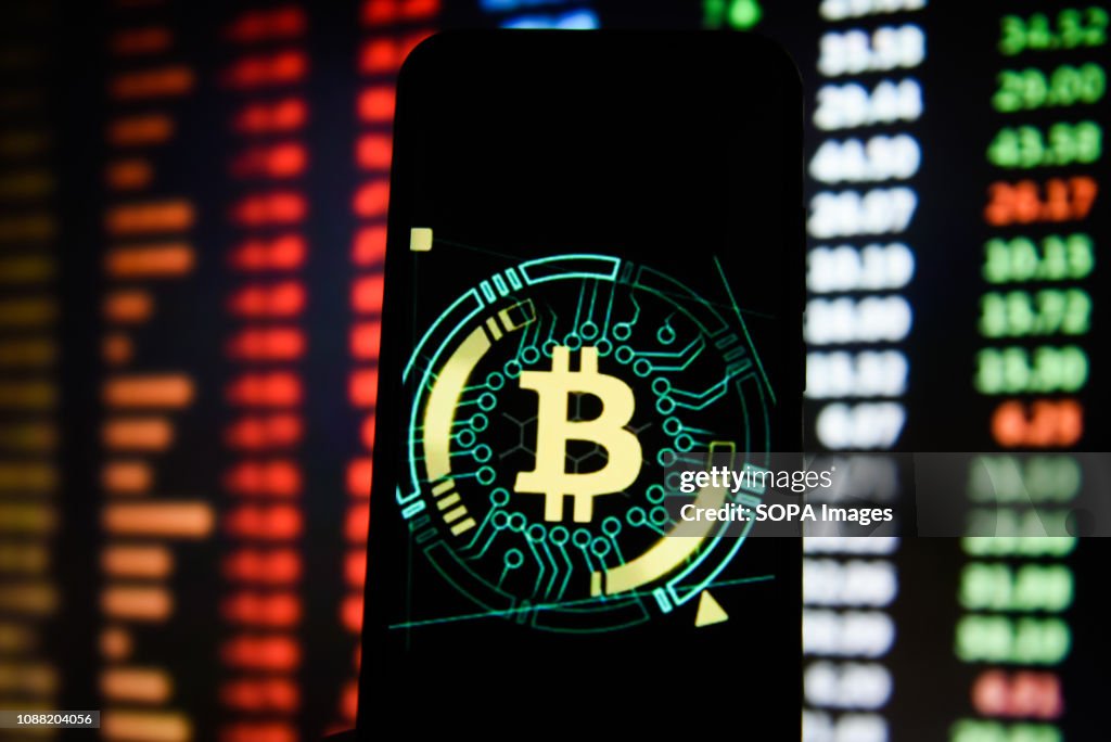 Bitcoin logo is seen on an android mobile phone