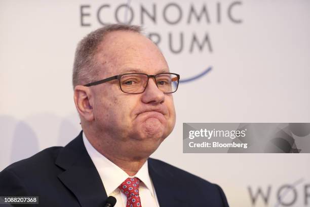 Mark Cutifani, chief executive officer of Anglo American Plc, reacts during a panel session on the closing day of the World Economic Forum in Davos,...